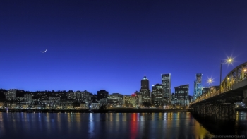 Portland city skyline, twilight, with crescent moon