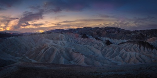 Zabriskia panorama during morning twilight, with moon